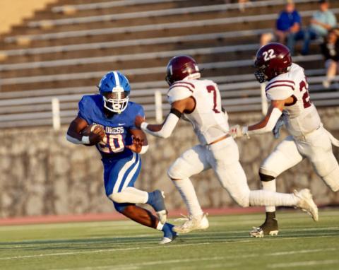Childress running back Da’Reon Mathis looks for room against the Abernathy Antelopes in a season opener Friday, Aug. 25 at Fair Park Stadium in Childress. Press Pass Sports/Nicole Dill