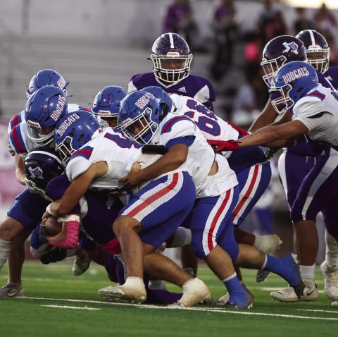 The Childress Bobcats swarm the Dimmitt ballcarrier Friday, Oct. 25 at Bobcat Stadium in Dimmitt. The Red River Sun/Nicole Dill