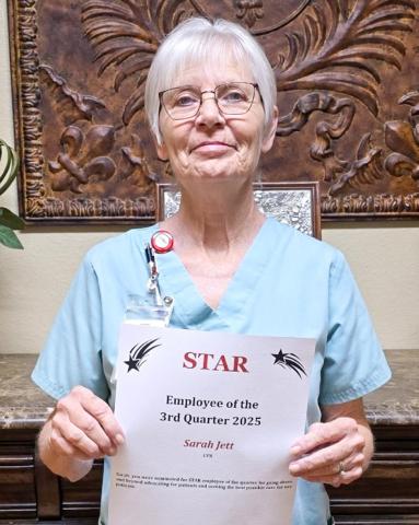 Sarah Jett, Licensed Vocational Nurse and Swing Bed Coordinator, accepts the STAR (Service, Teamwork, Attitude and Results) distinction for the third quarter of 2025 for going above and beyond, advocating for Collingsworth General Hospital patients and seeking the best possible care for the patients. Collingsworth General Hospital