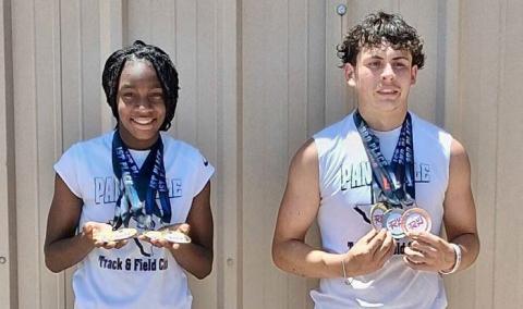 Texas Panhandle Track and Field Club’s Aija Johnson and Juno Castillo show off their hardware at the RUN West Texas track and field meet Saturday, June 14 at River Road High School in Amarillo. Texas Panhandle Track and Field Club