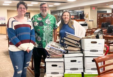 Clarendon College History Instructor Dr. Ken McIntosh, center, donates historic documents of W.E. Dode McIntosh, the Principal Chief of the Creek Nation, 1961-1972, to the Oklahoma Historical Society. From left: Clarendon College student Kayla Miller, K. McIntosh, Oklahoma Historical Society Registrar Veronica Redding. Contributors not pictured are Waldo McIntosh, Randy McIntosh and Gary Holloway. Randy McIntosh