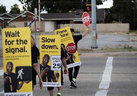 During the deadliest month of the year for pedestrians, the Texas Department of Transportation targets areas of high pedestrian activity and previously reported pedestrian crashes with street teams of “walking billboards,” which display key safety messages for drivers and pedestrians, Monday, Oct. 6 in Childress. Through the Lens of Liz