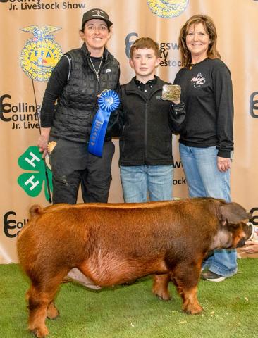 Maverick Orr shows the Breed Champion Dark Other Pure Breeds (DOPB) at the Saturday, Jan. 17 Collingsworth County Livestock Show, purchased by Ed Lagrone, Claude Crisp, Danny and Veronica Gray, Walser Farms/ Sunglo Feeds at the Premium Sale. Uplift Imaging