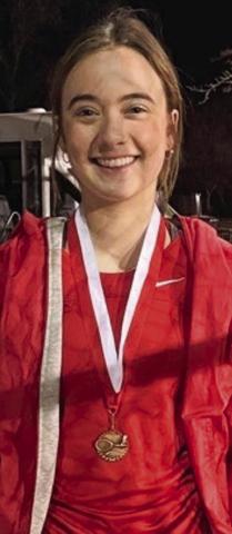 Lady Rocket junior Madeleine Kane takes the girls’ singles championship at the Wellington Tennis Tournament Wednesday, March 1. Courtesy Photos