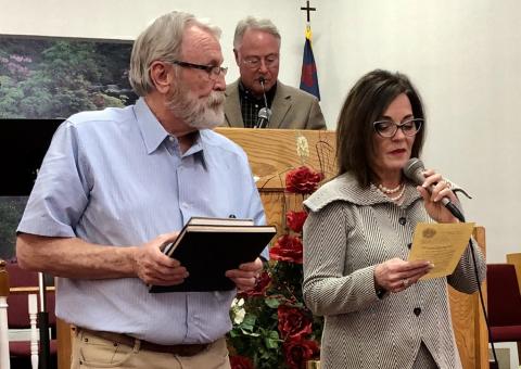 Vocalist and author Leah Fort, with her musician husband, Mike Fort, of Amarillo, accepts the pastorship of Wellington First Nazarene Church during a special service Sunday, Feb. 26, 2023. West Texas District Superintendent Dr. David Downs, of Fort Worth, presided over the conferment. Courtesy Photo