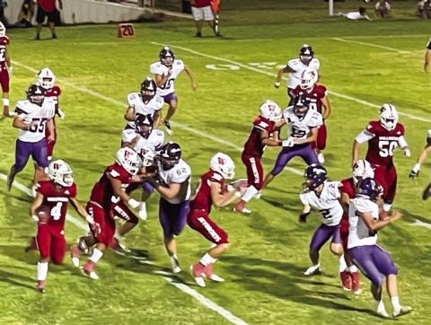 Skyrocket Gumaro Rincon (4) runs the ball behind the Rocket offensive line in a game against the undefeated Panhandle Panthers, where Wellington won 26-13 on Powell Field last Friday night, Sept. 23. The Red River Sun/Shauna Salinas