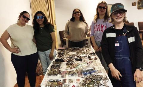 Leo Club assists Wellington Lions Club with packaging eyeglasses