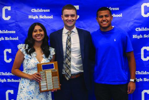Head golf coach Wayne Parker, center, awards Lady Cat Golf Most Valuable Player (MVP) Isabella Jurado, left, and Bobcat Golf MVP Isaiah Jalomo, right.