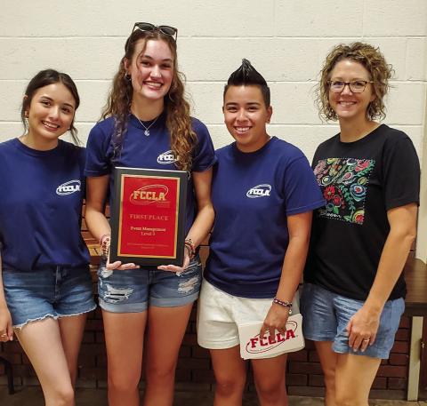 The Memphis High School (MHS) Family, Career and Community Leaders of America (FCCLA) senior team of Gizelle Rodriguez, Maggie Cook and Corrina Torres, along with MHS FCCLA Adviser Summer Lindley, visit the Memphis Lions Club Wednesday, July 12. The team presented their Students Taking Action with Recognition (STAR) Event Level 3 Event Management project, which they recently took gold with at the National Leadership Conference in Denver, Colo. Courtesy Photo