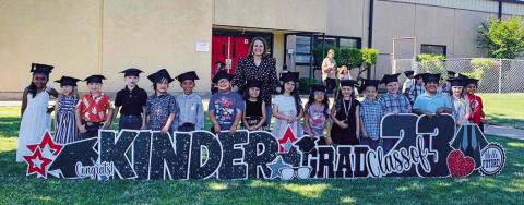 Kacy Cabbell’s kindergarten students celebrate their graduation with a special yard art sign. From left: Aliviah McGrady, Hallie Warren, Stratton Wynn, Ryker Justice, Kollin Hamner, Jaxon Coffee, Terrance Gonzales, Eliyah Navarro, Cabbell, Aubrie Rincon, Zayra Arizpe, Brynlee Holton, William Nanez-Melton, Landry Mixon, Layton Wynn, Katie Tarver, Jordan Alvarado. Courtesy Photos