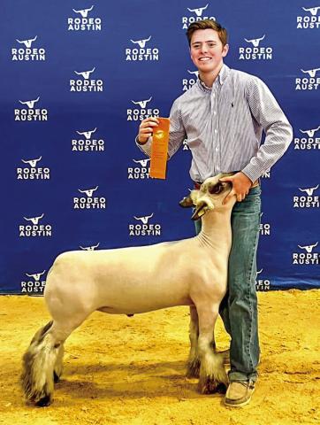 Memphis High School senior Carson Smith recently received eighth in his class with his medium wool cross at the Rodeo Austin Livestock Show. Smith, the son of Nathan and Trisha Smith, is involved in 4-H; FFA; Family, Career and Community Leaders of America (FCCLA); and One Act Play. Courtesy Photo