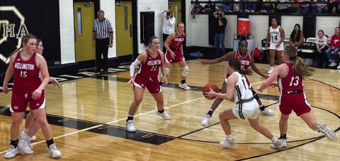 Lady Rockets Briley Waters (15), Audrey Jones (22), Kaitlin Bawcom (13), Asia Shrubs (21) and Presley Kane (2) stand defensive as a Lady Indian drives up court, hoping to put some points Friday night, Feb. 3. The Red River Sun/Shauna Salinas