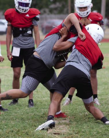 Wellington seniors, teammates put on pads for Rocket Pride
