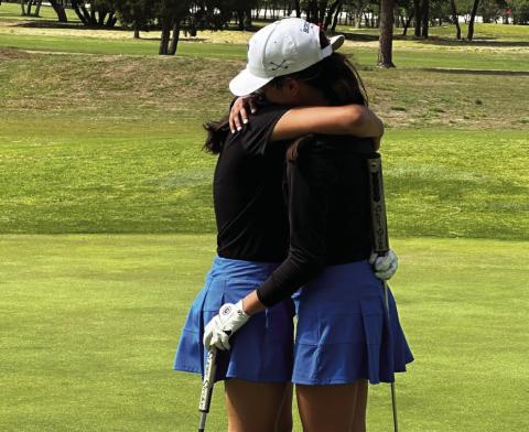 Childress’ Elena Jurado hugs her younger sister, Isabella Jurado, after defeating her in a playoff hole during the Region 1-3A Tournament to qualify for the final spot to the UIL Class 3A State Tournament. Courtesy Photo
