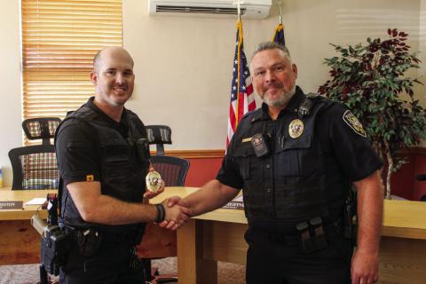Childress Police Department Chief Bill Bridgwater welcomes Officer Glen Egerton, of Childress, aboard the department at a swearing-in ceremony Wednesday, Aug. 7 in the Childress City Hall Council Chambers. The Red River Sun/Elizabeth Tanner