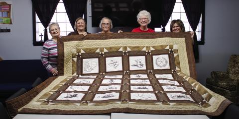 Joyful Quilters members, from left, Virginia Etheredge, Carrie Dobbs, JoAnn Meyer, Peggy Teague and Faith Self display their 2022 quilt, which will be raffled at the Childress Methodist Women Bazaar and Food Fest on Saturday, Nov. 19 at the Childress First United Methodist Church. Not pictured are Yvonne Ellis, Gina Inman and Mary Sanders. The Red River Sun/Elizabeth Tanner