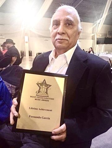 KLSR 105.3 radio personality Fernando “Cricket” Garcia is honored with the Lifetime Achievement Award at the Second Annual West Texas Lifetime Music Awards, organized by 22 Entertainment, Saturday, March 21 at the Prima Vista Event Center in Lubbock. Courtesy Photo