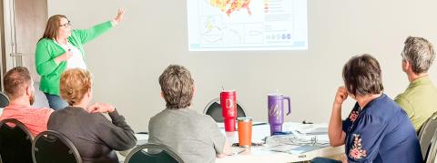 Jennifer Puryear, a meteorologist with RMBJ Geo, Inc., describes the 2026 drought monitor data to the attendees at the recent Rainwater Harvesting Workshop in Wellington. BEV ODOM/THE GREENBELT INTREPID