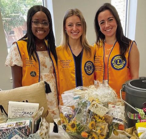 Wellington Lions Club Sweethearts Jayla Kilgore, left, Summer Neufeld and Summer Owens assist with the Sunday, May 19 theme basket drawing in support of the fundraiser for Kilgore’s ongoing treatment of Neuromyelitis Optica (NMO). Courtesy Photo