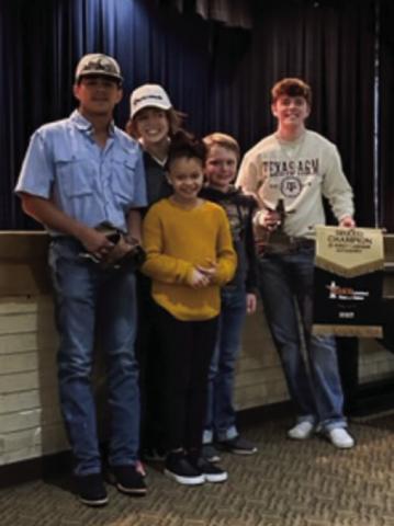 The Memphis Independent School District (ISD) School Board recognizes students Gabriel Zuniga, left, Braylee Brooks, Tucker Brooks, Carson Smith and Kyree Johnson for their recent stock show winnings. Photos Courtesy of Memphis ISD