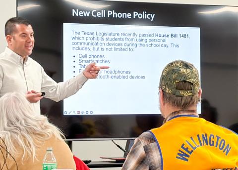 Wellington High School Principal Jermaine Cantu addresses the Wellington Lions Club at the Monday evening, March 16 meeting. Cantu emphasized that the new cell phone policy, imposed by the Texas Legislature, has initiated face-to-face social interactions that were previously paused by cell phone use. “Overall, it’s a really good policy,” Cantu said. The Red River Sun/Bev Odom