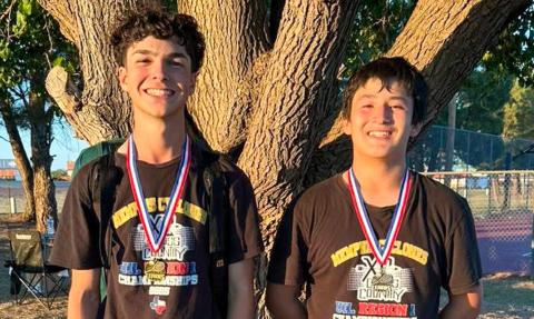 Memphis’ Kyler Robison, left, takes first place in the boys’ singles Monday, May 11 at the Memphis Tennis Tournament, followed by fellow Cyclone Leo Zarate, who finished second. MEMPHIS ISD