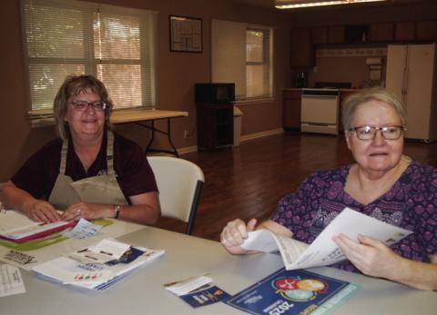 Texas A&M AgriLife Extension Service of Childress County Family and Community Health Agent Sandra Moody, left, presents the second session of the four-part series A Fresh Start to a Heathier You! Thursday, Nov. 21 at the Childress Housing Authority—Shady Grove Apartments Meeting Room. Among attendees was Phyllis Preston, right. Photo by Grace Holman