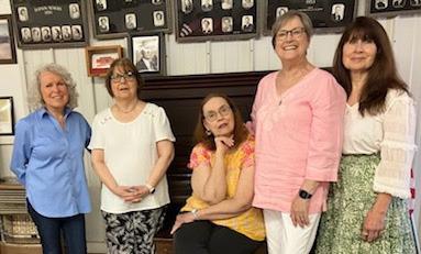 Friends gather amongst the class photos at Dodson’s 68th Annual Ex-Students Reunion Saturday, May 24 at Dodson Town Hall. From left, Carol Stribling-Chatham, of Pampa; Sheila Ford Lewis, of Hollis, Okla.; Cindy Hightower, of Plainview; Nancy Gulley Crawford, of Tyler; and Glenda Hightower Sena, of Dodson.