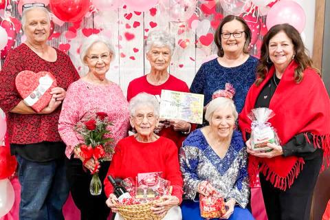 Members of Wellington Senior Citizens Center display door prizes won at the 6 p.m. Friday, Feb. 13 Valentine’s Day social at the Bura Handley Community Center. The Plaza Restaurant, of Childress, catered the festive event, providing beef and chicken fajitas, sides, dessert and drinks. Front row, from left: Sallie O’Hair, LaJaunda Ressell. Back row, from left: Debra Belew, Carolyn Keller, Pat Roberson, Marie White, Margret Wood. Wellington Senior Citizens Center