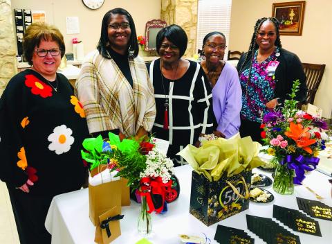 Guest of honor Mary “Cindy” White gathers with her family and Collingsworth General Hospital Administrator Candy Powell during the recent reception in the dining room of Parkview Manor Assisted Living to mark 50 years of service as an incredible nursing assistant. With a “Cheers to 50 Years!” theme, visitors brought gifts, flowers and cards to congratulate White. From left: Powell, daughter Erica Thomas, White, granddaughter Brianna Morning, daughter Brandy Thomas. The Red River Sun/Bev Odom