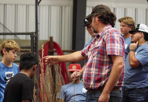 United States Department of Agriculture (USDA) Natural Resources Conservation Service Center Childress District Conservationist Randall Linex teaches students about Texas native grasses during the 25th Annual Childress County Ag Day Thursday, Oct. 24 at the Mashburn Event Center and Arena. The Red River Sun/Elizabeth Tanner