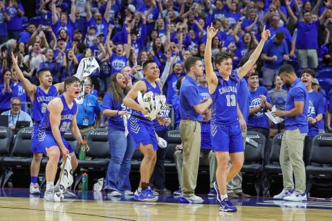 In March, the Childress Bobcats, including Jesus Jalomo (23), Scout Smith (20), student athletic trainer Rebekkah Guzman, Isaiah Jalomo, coach Wayne Parker, Billy Moore (13) and coach Caleb Tucker, celebrated a historical season, advancing to the state championship for the first time since 1944. Photo by Robbie Rakestraw