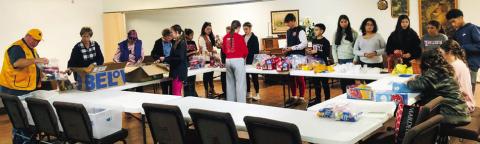 Students assist Wellington Lions Club with senior snack packs