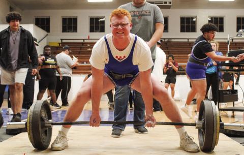 Childress’ Ethan Ferguson deadlifts 435 pounds, rounding out his 1,175-pound total and winning weight class 242 at the Childress High School Boys Powerlifting Invitational Thursday, Feb. 2. The Red River Sun/Elizabeth Tanner