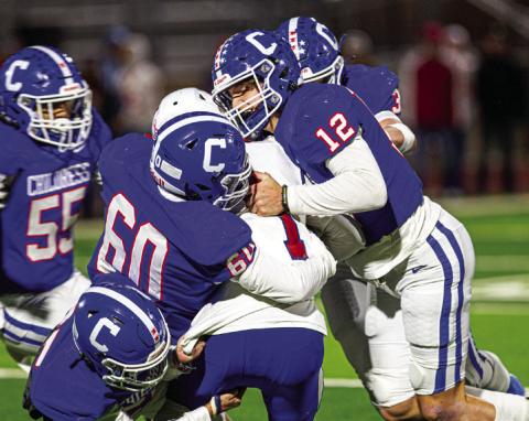 Childress’ Seth Taylor (12), (3), (60), (55) and (25) take down Coahoma’s Reagan Chapman (1) during the Bobcat’s Bi-District Championship win Friday, Nov. 11. The Red River Sun/Nicole Dill