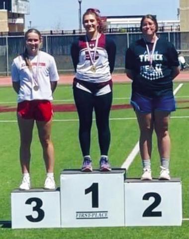 Junior Kaitlin Bawcom, left, throws bronze at the Region 1-2A Track and Field Championships Saturday, April 29 at West Texas A&amp;M University. Courtesy Photos
