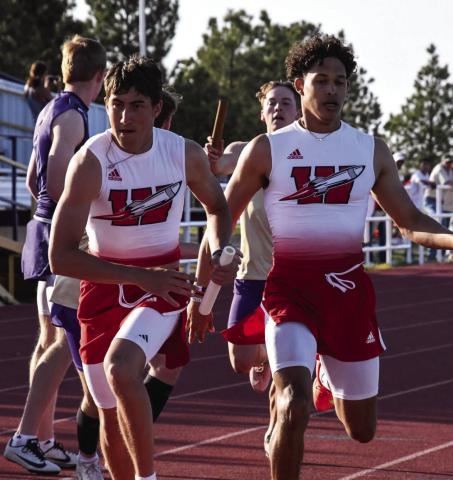 Wellington’s Brenden Garcia hands off to Callen Kane during the Skyrockets’ area championship title at the recent UIL 2A Area 1-2 Championships Wednesday, April 9 at Panther Stadum in Panhandle. Press Pass Sports/Tori Bunch