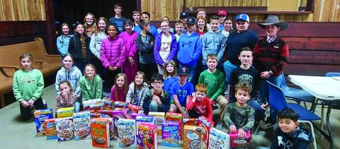 Childress County 4-Hers recently donate boxes of cereal to Food4U Food Pantry of Childress. Food4U, a nonprofit organization providing nutritional assistance to the residents of Childress County, is open from 3-5 p.m. Monday, Wednesday and Friday. Applications can be picked up at Food4U or New4U Thrift Store. Applicants must meet income requirements to receive assistance. Courtesy Photo