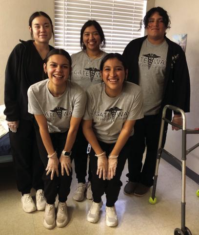Wellington High School Class of 2025 Health Science students experience hands-on training at Wellington Care Center to earn their 40 clinical hours required for their Certified Nurse Aid Certification. Front row, from left: Kendra Molina, Christell Melendez. Back row, from left: Kenzi Ballinger, Jelly Garcia, Benji Garcia. The Red River Sun/Bev Odom