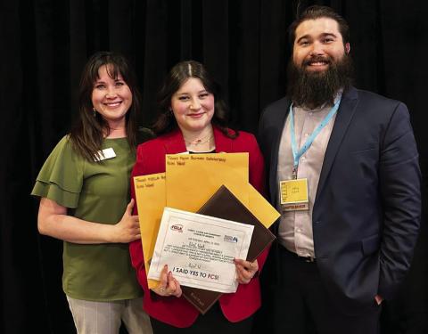 National Vice President of Public Relations Kimi Ward, a Childress High School (CHS) Family, Career and Community Leaders of America (FCCLA) chapter member, is awarded the C.J. Davidson Scholarship, Texas Farm Bureau Scholarship and Texas FCCLA Regional Scholarship at the Special Recognition Session at the recent State Leadership Conference in Dallas. Ward, center, is joined by CHS FCCLA Advisors Amy Detwiler, left, and Jeffrey Collins, right. Childress FCCLA