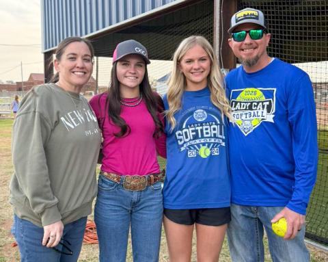 The Childress Lady Cat softball team enjoys a family and team dinner, hosted by parents of the players, Monday, March 23.