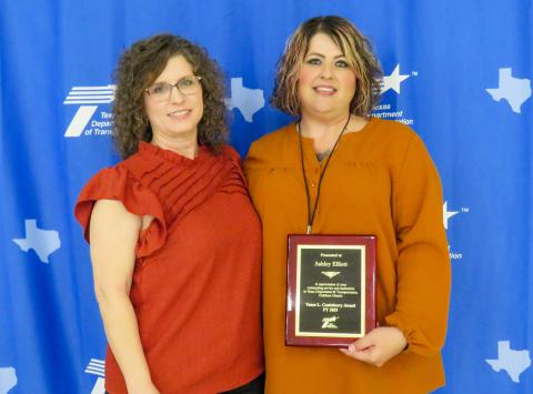 Ashley Elliott, Construction Recordkeeper at the Childress Area Office, is presented with the Vance L. “Huck” Castleberry award. Elliott, right, began her career at TxDOT in 2020 as an HR Generalist, a role she served in until her relocation to the Childress Area Office in 2024. Texas Department of Transportation