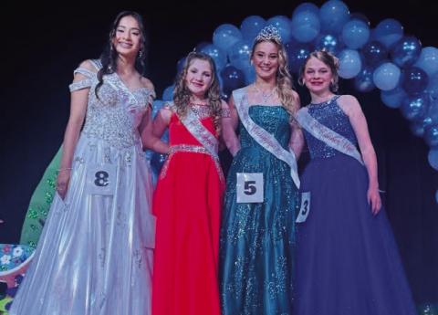 Teen Miss Wellington 2025 Ava Kate Inman, second from right, gathers with third runnerup Hazel Estrada, left, first runner-up Evey Henard and second runner-up Halle Hedrick. Wellington High School Booster Scholarship Pageant