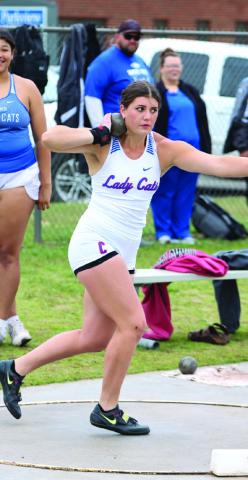 Childress’ Taylor Wiseman takes a first-place throw in shot put during the Bobcat Relays Thursday, March 21 in Childress. Childress High School Yearbook Staff/ Kaylie Oronia