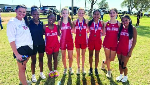 The Wellington Lady Rockets will compete at the Region 1 Cross Country Championships Monday, Sept. 21 at Mae Simmons Park in Lubbock. From left: Coach Savannah Henderson, Angela Lewis, Aleah Lewis, Addalyn English, Taytum Kane, Leslie Orozco, Anna Henard, Sabrina Segovia. Courtesy Photos