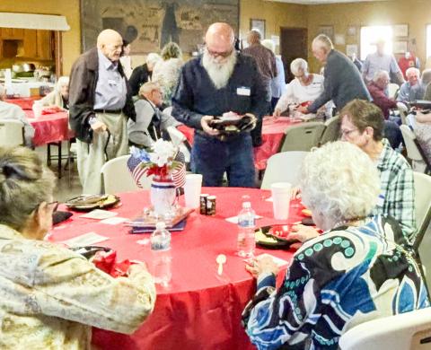 Folks embrace the fellowship during the Saturday evening, April 4 Quail Ex-Student Reunion at the Quail Community Building. Clockwise, from left: guest Sharon Starkey, of Wellington; Troy Harrison, of Amarillo; Bobby and Anita Dodez, of Texarkana; Vada Bell Wood, of Wellington. COURTESY PHOTO