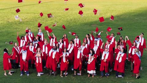 Wellington High School Class of 2025 graduates toss their caps in celebration of receiving their diplomas following the 7 p.m. ceremony Friday, May 16 on Powell Field at Skyrocket Stadium. The Red River Sun/Bev Odom