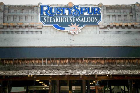 Rusty Spur Steakhouse and Saloon opens its doors to the public Tuesday, June 17, offering hand-cut certified Angus beef, a full bar, a pool table and the most anticipated amenity, a salad bar, complete with fresh vegetables daily. Through the Lens of Liz