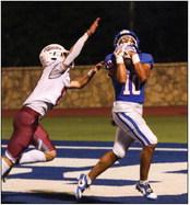 Childress’ Isaiah Jalomo (10) catches a 24-yard pass from quarterback Drake Rabe in the Bobcat endzone during the third quarter Friday, Sept. 22 at Fair Park Stadium. Photos by Childress High School Yearbook Staff