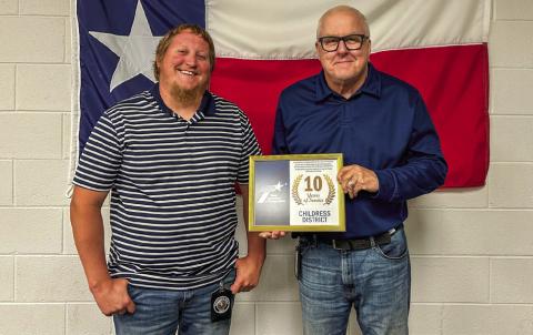 Texas Department of Transportation Childress District Engineer Darwin Lankford awards General Engineering Technician Chance Cozart for 10 years of service. Photos Courtesy of TxDOT Childress District